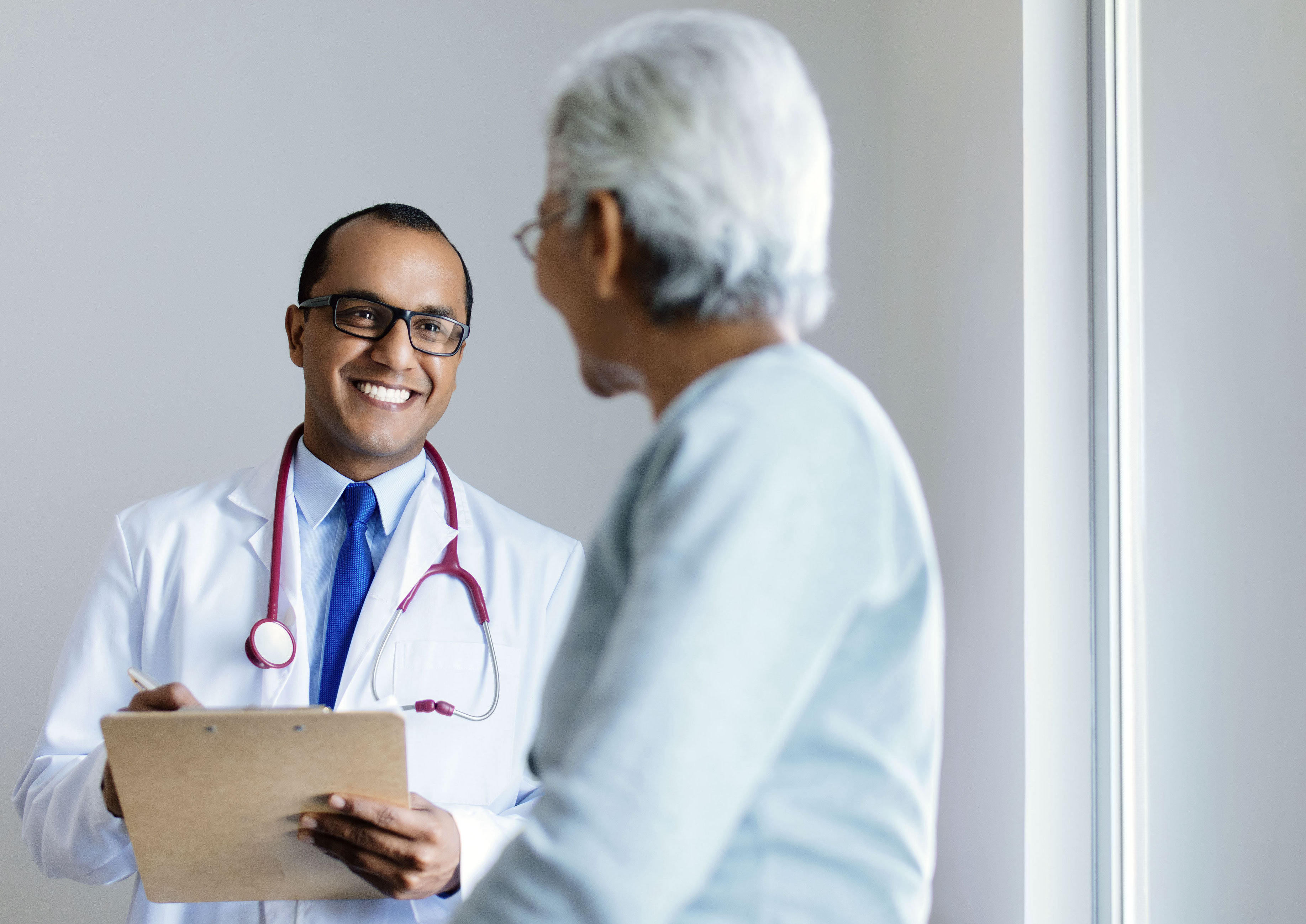 Doctor smiling at patient during appointment